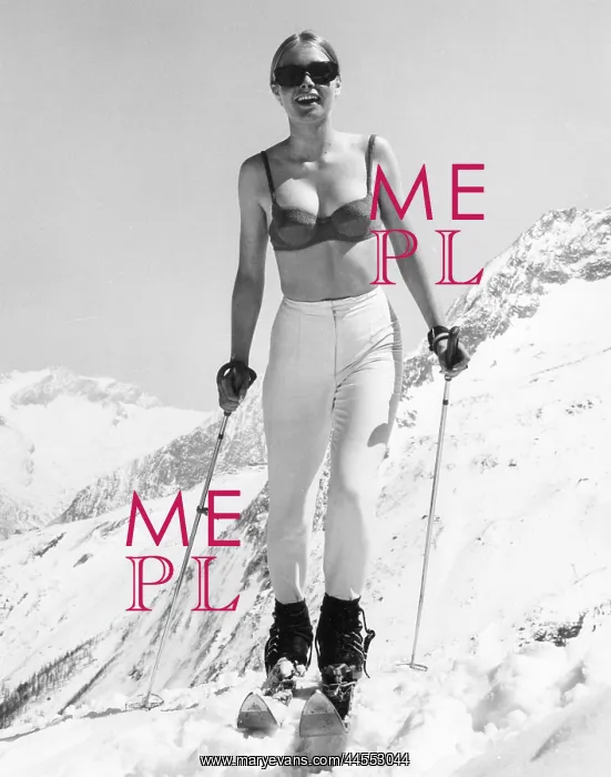 : BRA SKIER. A rash young woman braves the ski slopes wearing just her bra and slacks : BRA SKIER. A rash young woman braves the ski slopes wearing just her bra and slacks