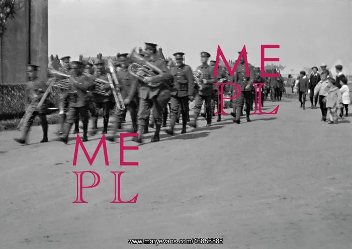 : Brass band marching along a road : Brass band marching along a road