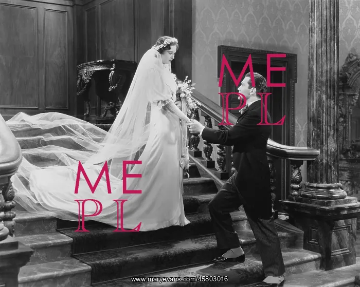 : Bride and groom, looking rather serious : Bride and groom, looking rather serious