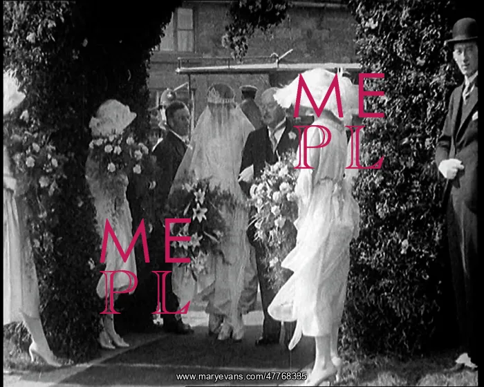 : Bride and Groom Walking Through Flowery Arch : Bride and Groom Walking Through Flowery Arch
