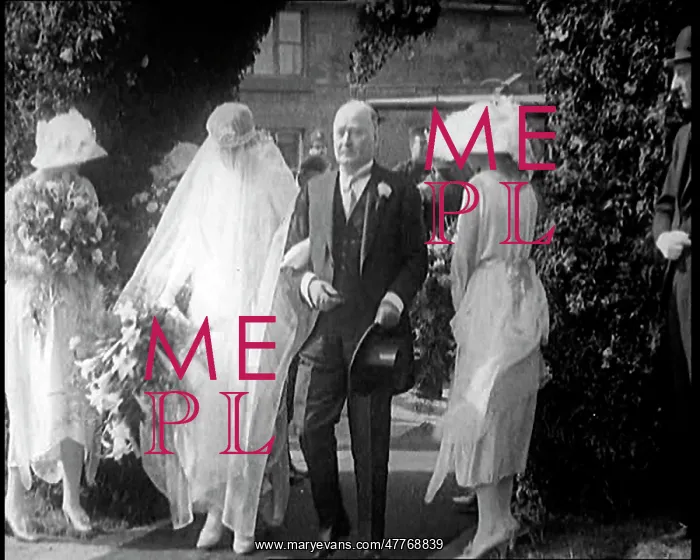 : Bride and Groom Walking Through Flowery Arch : Bride and Groom Walking Through Flowery Arch