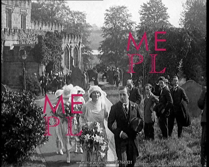 : Bride and Groom Walking Through Gardens Of : Bride and Groom Walking Through Gardens Of