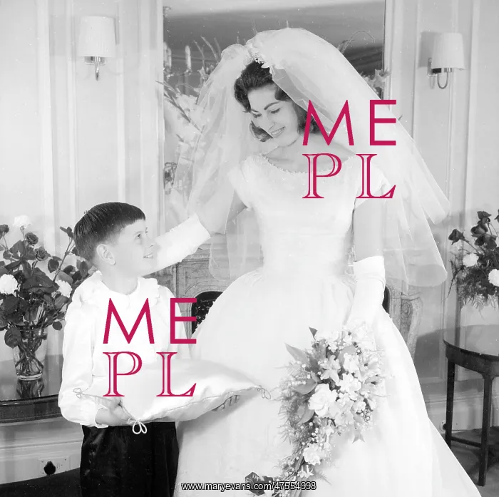 : A bride and page boy at a wedding : A bride and page boy at a wedding
