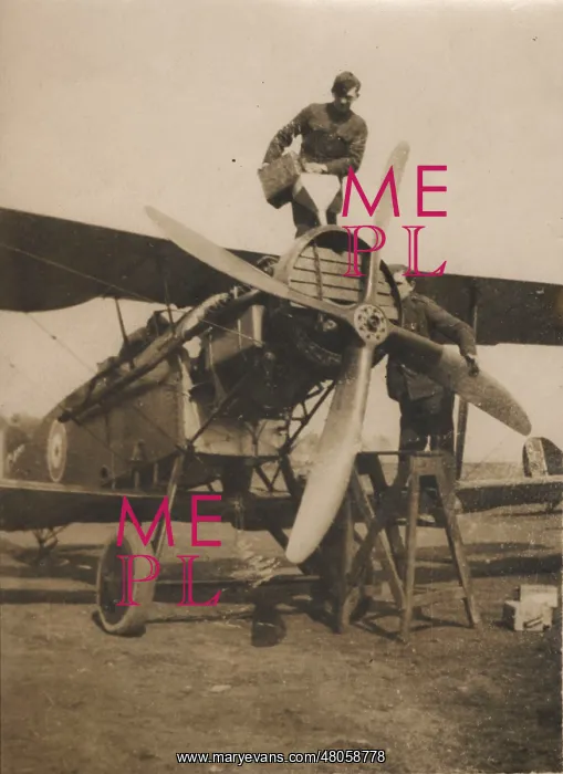 : A Bristol Fighter has its radiator filled : A Bristol Fighter has its radiator filled