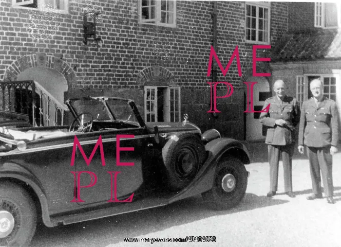 : Two British army officers with their car : Two British army officers with their car