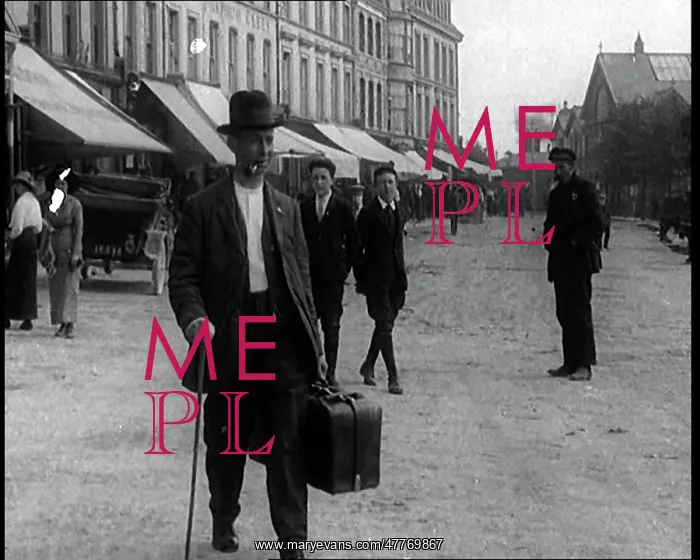 : A British Man With A Limp Crossing A Street : A British Man With A Limp Crossing A Street