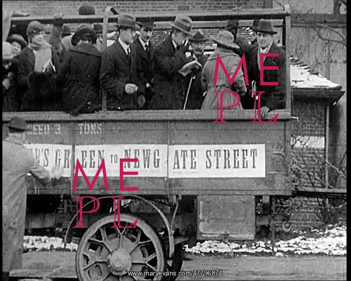 : British People Standing on a Passenger Lorry : British People Standing on a Passenger Lorry
