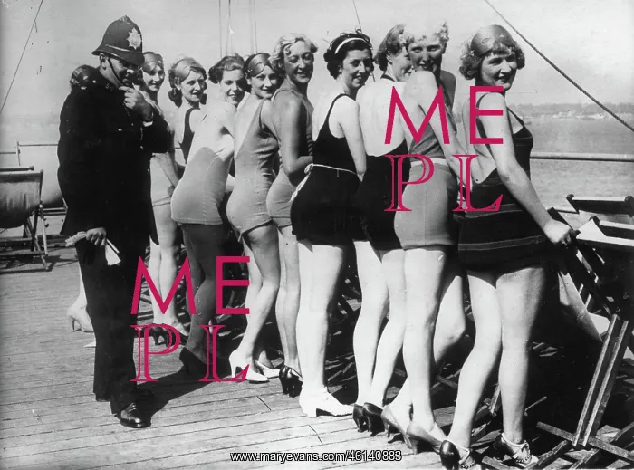 : A British policeman (Bobby) with women : A British policeman (Bobby) with women
