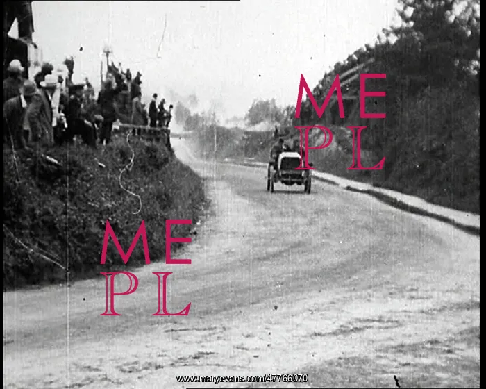 : British Racing Car Speeding Around A Corner : British Racing Car Speeding Around A Corner