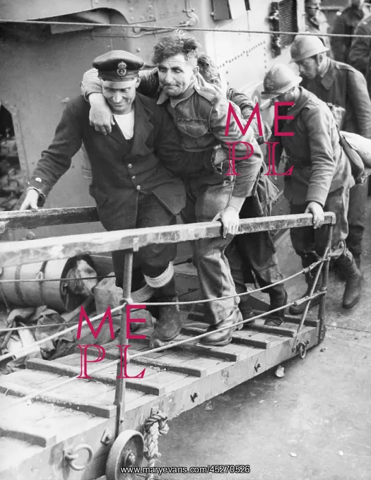 : A British sailor assisting a wounded Tommy, WW2 : A British sailor assisting a wounded Tommy, WW2