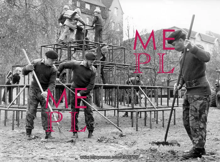 : British soldiers cleaning playground in Berlin : British soldiers cleaning playground in Berlin