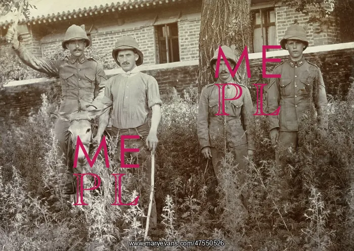 : British soldiers with a donkey in China : British soldiers with a donkey in China