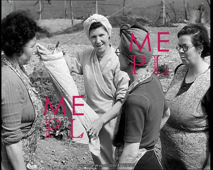 : Four British Women Wearing Aprons Talking By : Four British Women Wearing Aprons Talking By