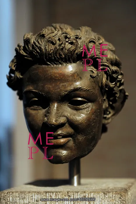 : Bronze head from the statue of a satyr. About 100 BC : Bronze head from the statue of a satyr. About 100 BC