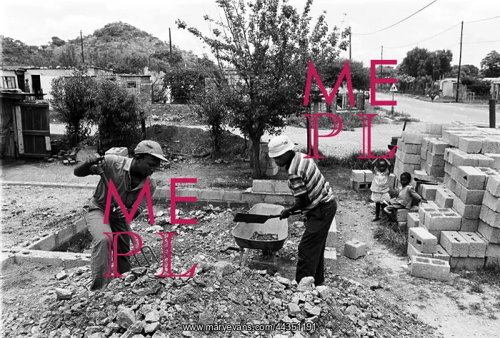 : Builders at work in Oukasie Township, Brits. North : Builders at work in Oukasie Township, Brits. North