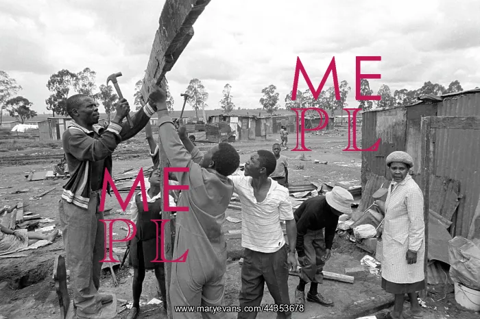 : Building shack home in a township. After the Apartheid : Building shack home in a township. After the Apartheid