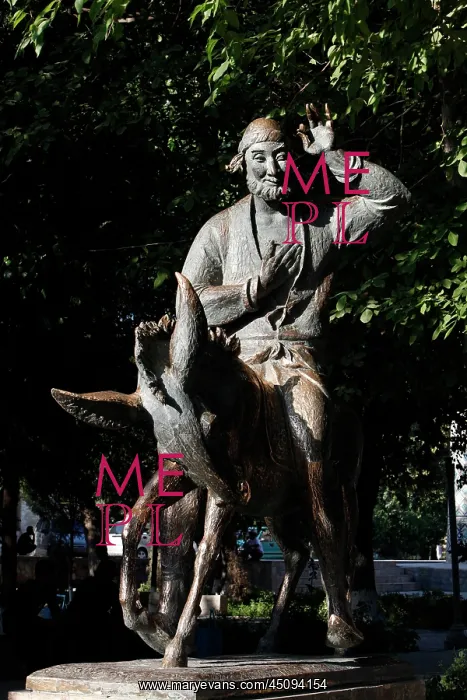 : Bukhara. View from the front of Soviet Statue of Nasreddin Hodja riding a donkey : Bukhara. View from the front of Soviet Statue of Nasreddin Hodja riding a donkey