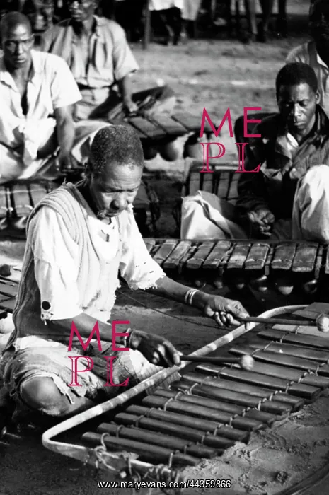 : Bulafu(in foreground) village maker of Timbila and : Bulafu(in foreground) village maker of Timbila and