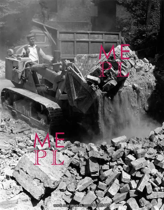 : BULLDOZING A BUILDING : BULLDOZING A BUILDING