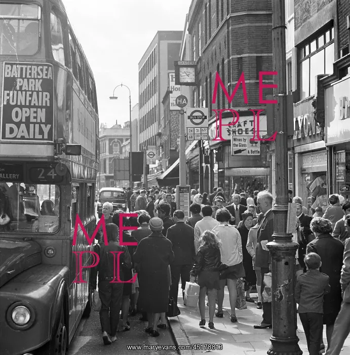 : Bus queue. A view looking north along Camden High Street in London showing : Bus queue. A view looking north along Camden High Street in London showing