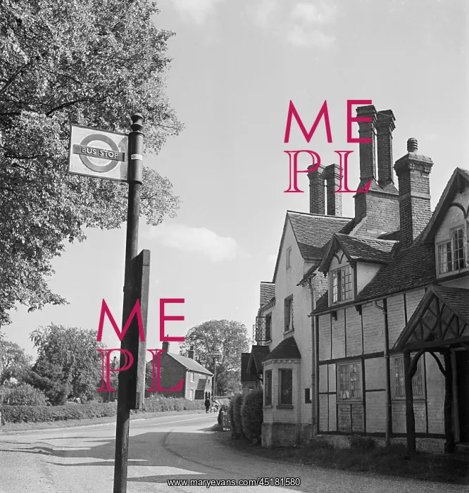 : Bus Stop. Bus stop on the corner of a village road opposite Old Well Cottage : Bus Stop. Bus stop on the corner of a village road opposite Old Well Cottage