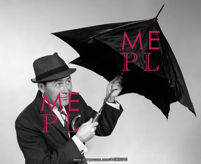 : Businessman opening up umbrella : Businessman opening up umbrella