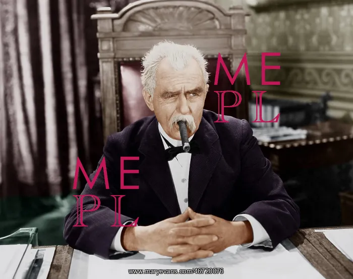 : Businessman smoking cigar at desk : Businessman smoking cigar at desk