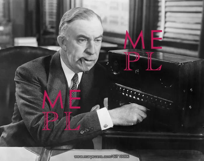 : Businessman using intercom : Businessman using intercom