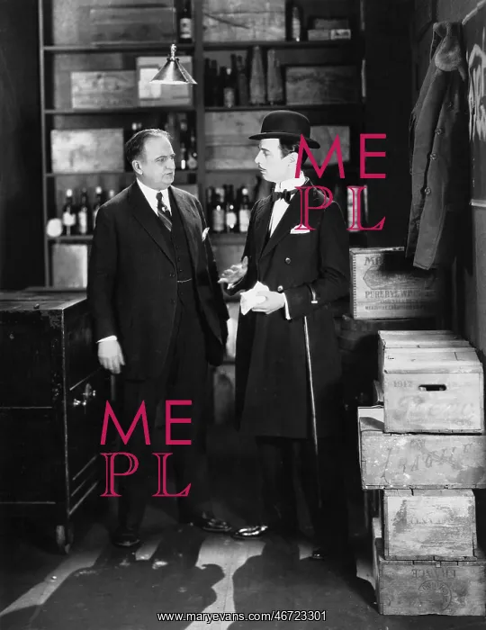: Businessmen conversing in storeroom : Businessmen conversing in storeroom