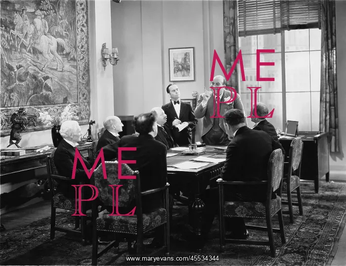 : Businessmen meeting in a boardroom : Businessmen meeting in a boardroom