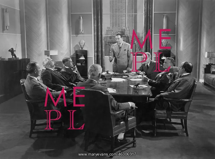 : Businessmen meeting in a boardroom : Businessmen meeting in a boardroom