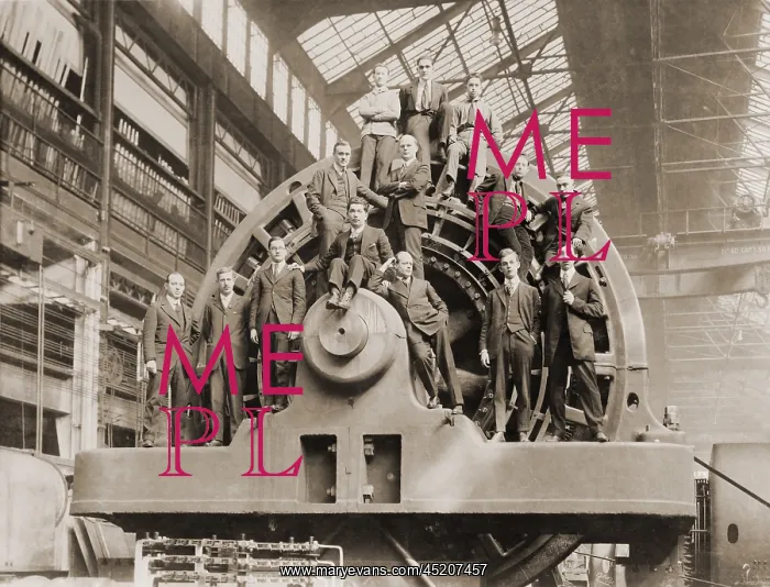 : Businessmen pose on a giant Westinghouse ? : Businessmen pose on a giant Westinghouse ?