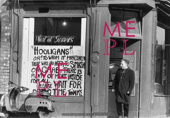 : Butcher with sign to hooligans - Manchester 1966 : Butcher with sign to hooligans - Manchester 1966