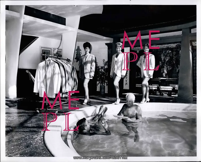 : Buyer in pool views three models before placing his order : Buyer in pool views three models before placing his order