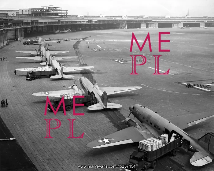 : C-47s unloading at Tempelhof Airport during the : C-47s unloading at Tempelhof Airport during the