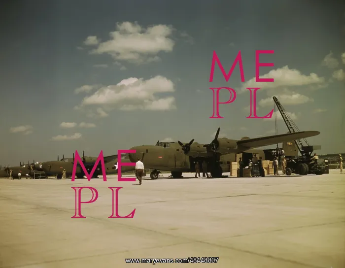 : C-87 Liberator Express transports being loaded : C-87 Liberator Express transports being loaded
