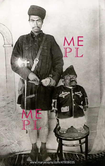 : c.1920's - Afghan dwarf and human giant, c.1920 : c.1920's - Afghan dwarf and human giant, c.1920
