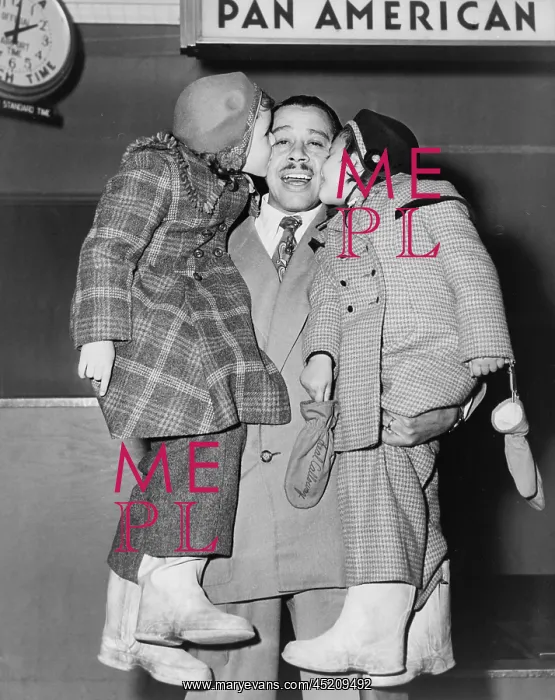 : Cab Calloway (1907-1994), greeted by his ? : Cab Calloway (1907-1994), greeted by his ?