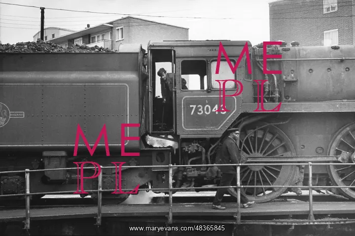 : Cab and tender of steam engine on turntable : Cab and tender of steam engine on turntable