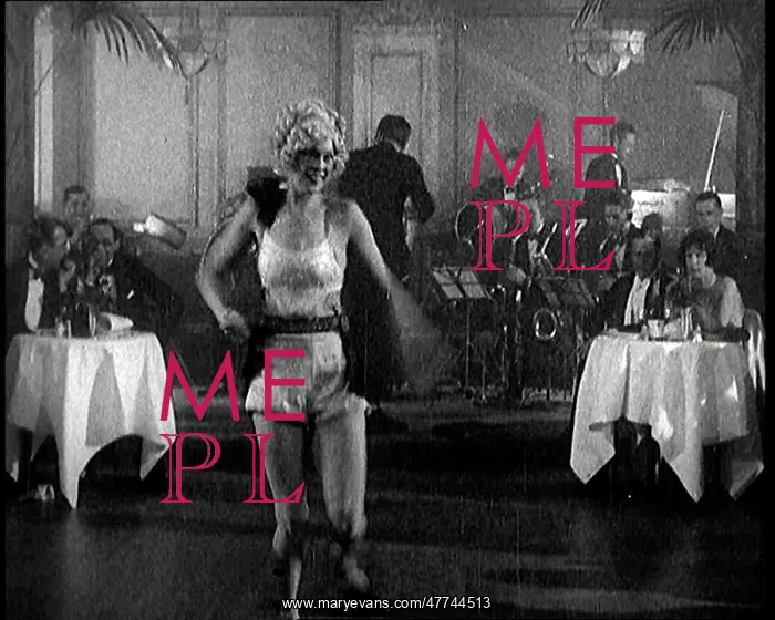 : A Cabaret Performer Dancing To Music Being : A Cabaret Performer Dancing To Music Being