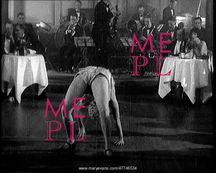 : A Cabaret Performer Dancing To Music Being : A Cabaret Performer Dancing To Music Being