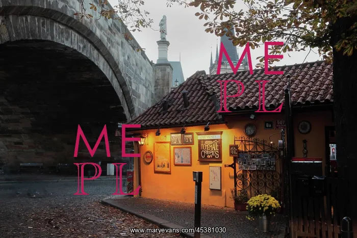 : Cafe Marnice under an arch of the Charles Bridge : Cafe Marnice under an arch of the Charles Bridge