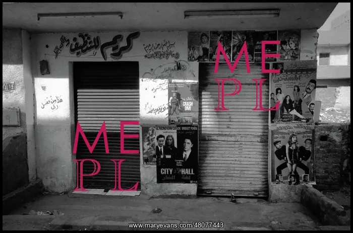  : Cairo, Egypt - Roadside shop with posters graffiti etc