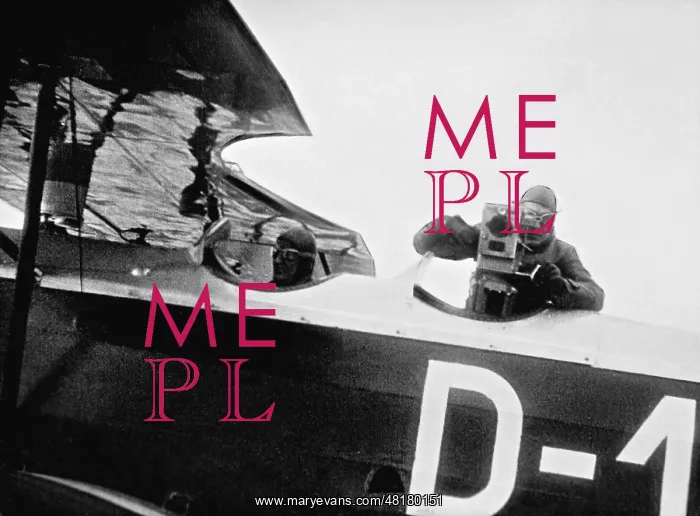 : Cameraman during shooting from a plane : Cameraman during shooting from a plane