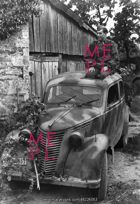 : Camouflaged German car in Normandy, 1944 : Camouflaged German car in Normandy, 1944
