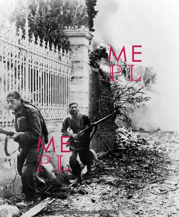 : Two Canadian soldiers edge along wall, on the : Two Canadian soldiers edge along wall, on the