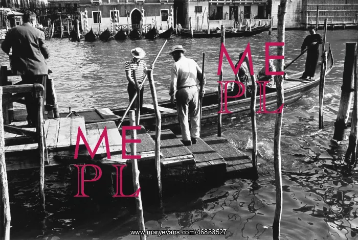 : Canal in Venice with a gondola : Canal in Venice with a gondola