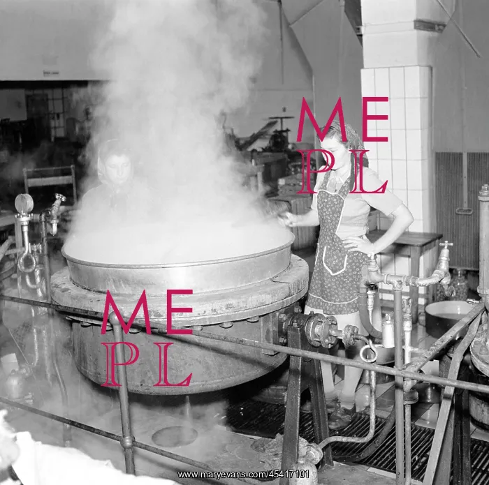 : Canning. Czechoslovakia, Rokycany 1948. Worker attends giant pot in jam / jelly factory : Canning. Czechoslovakia, Rokycany 1948. Worker attends giant pot in jam / jelly factory