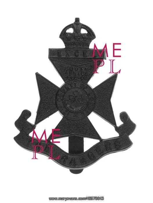: One of two cap badges associated with L / Cpl J R Dixon : One of two cap badges associated with L / Cpl J R Dixon