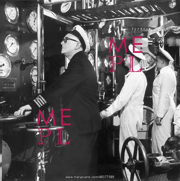 : The captain checks the dials : The captain checks the dials